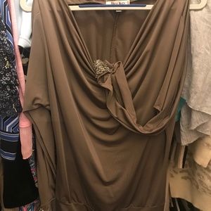 Brown shirt with slit arms and silver design on shoulders and cuffs